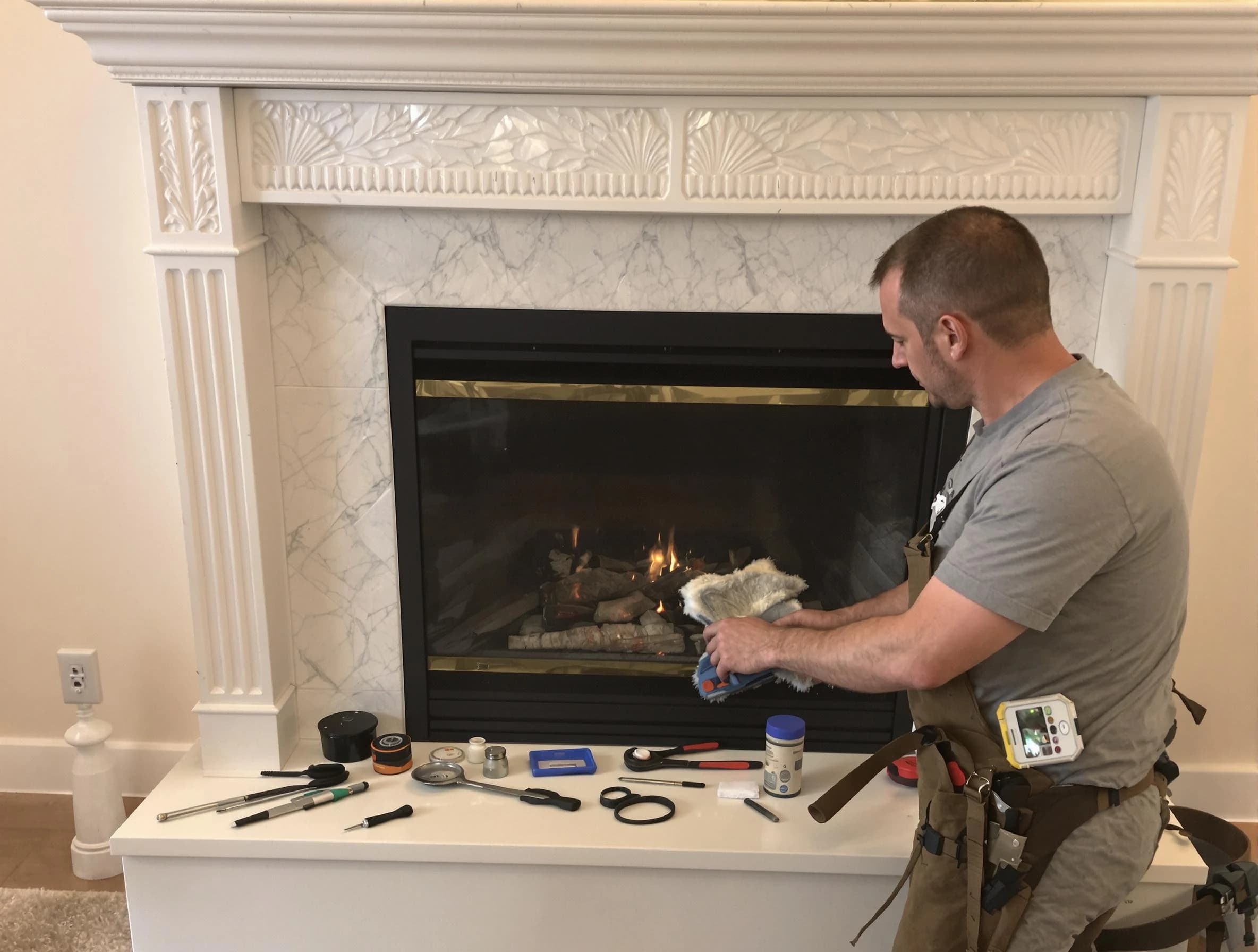 Piscataway Chimney Sweep performing fireplace maintenance in Piscataway, NJ